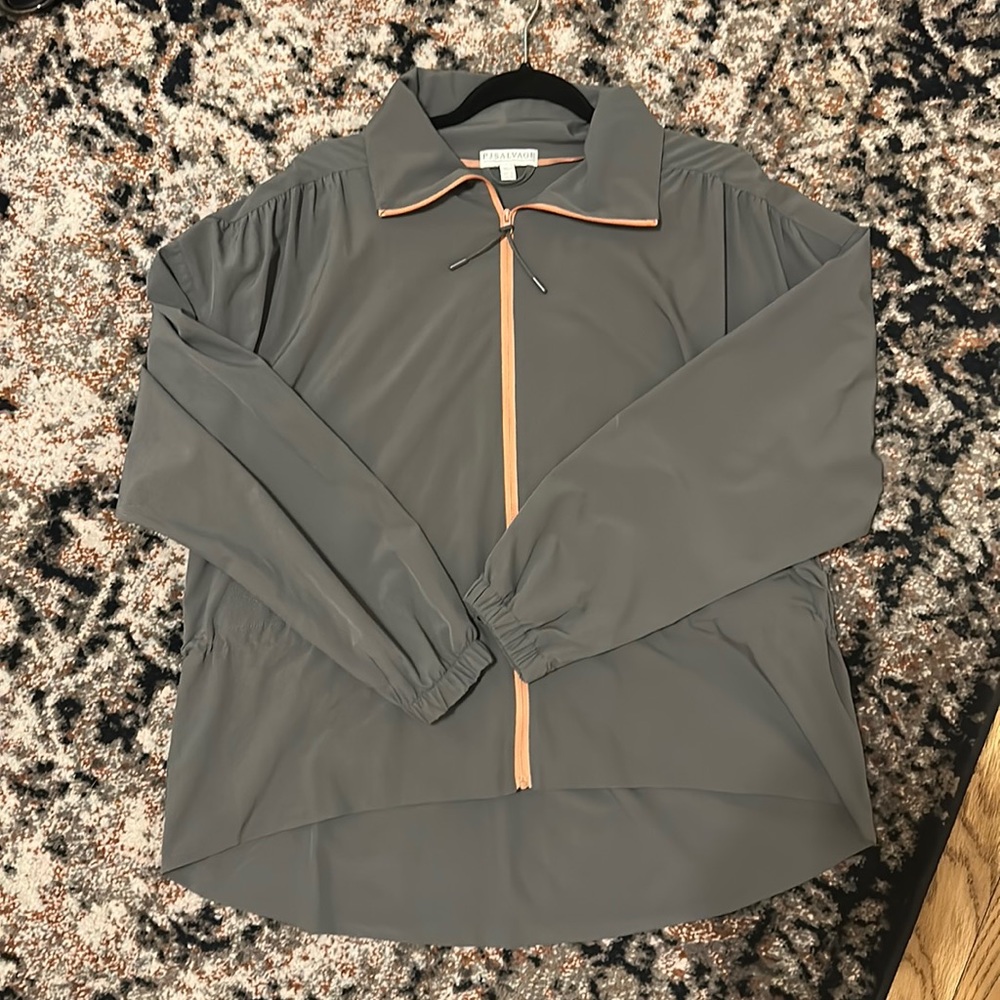 NWOT. Woman’s P.J. Salvage zip up light weight top. Size M.